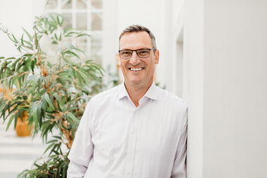 Headshot photograph of Cameron Mitchell