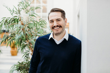 Headshot photograph of Ilja Kondratjuks