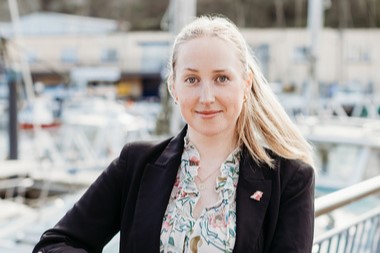Headshot photograph of Amy Harrison