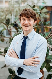 Headshot photograph of Greg Kelly