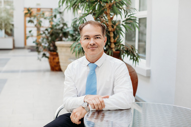 Headshot photograph of Gavin Walker